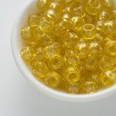 BD00083-02-biscotti-yellow-barrel-sparkle-pony-beads-6×9mm